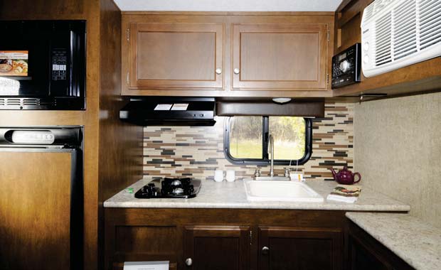 The Sonic 167 features a rear galley with ample counter space.