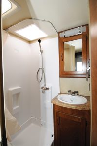 The rear corner bathroom is surprisingly spacious