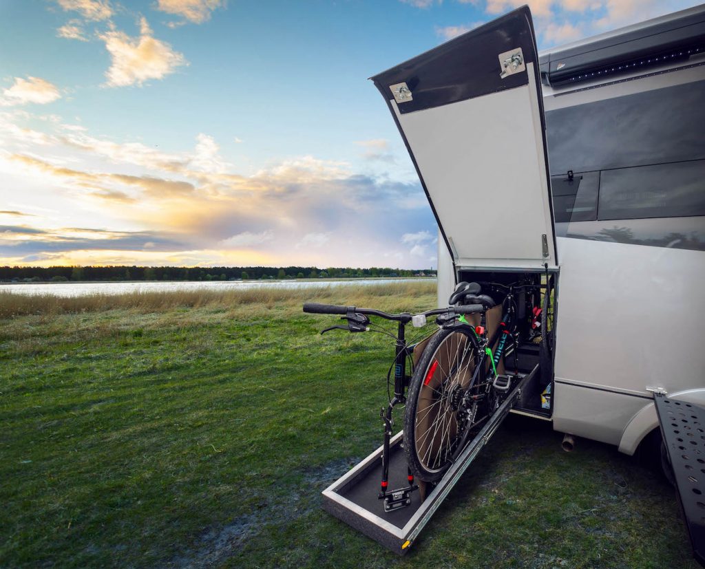 A bicycle storage feature on a leisure travel van wonder rear twin bed..