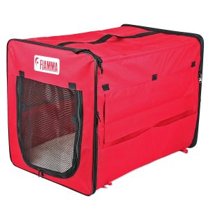 A red collapsible dog crate.