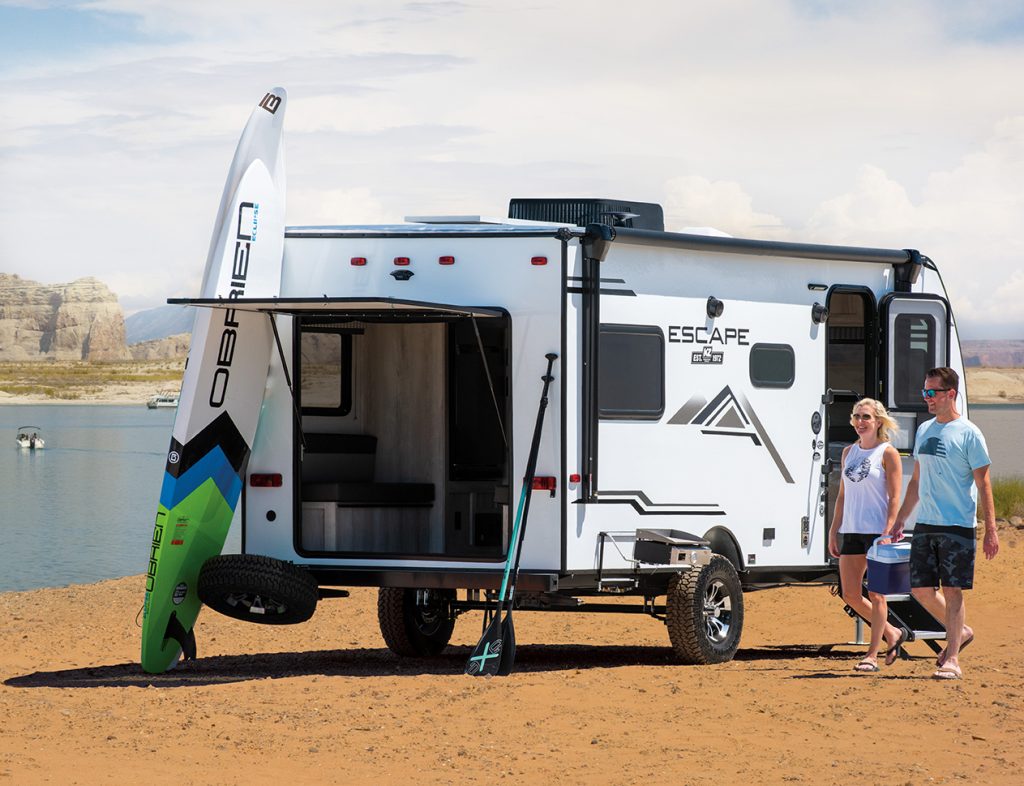 https://www.rvlifemag.com/wp-content/uploads/2021/07/web-2021-KZ-RV-Escape-E17-HATCH-Travel-Trailer-Exterior-Lifestyle-Couple-Lak...-1024x786.jpg