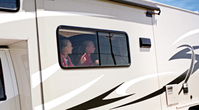 RVing with kids - the window seat is always the preferred spot for kids in RVs.