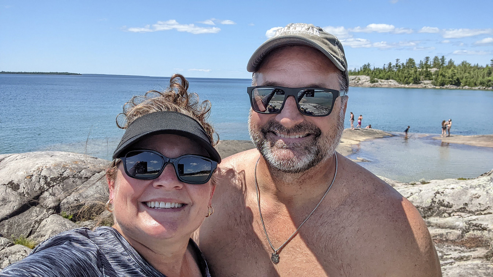 Ben & Cheryl Coles enjoying the sun on the shoreline of Bathtub Island.