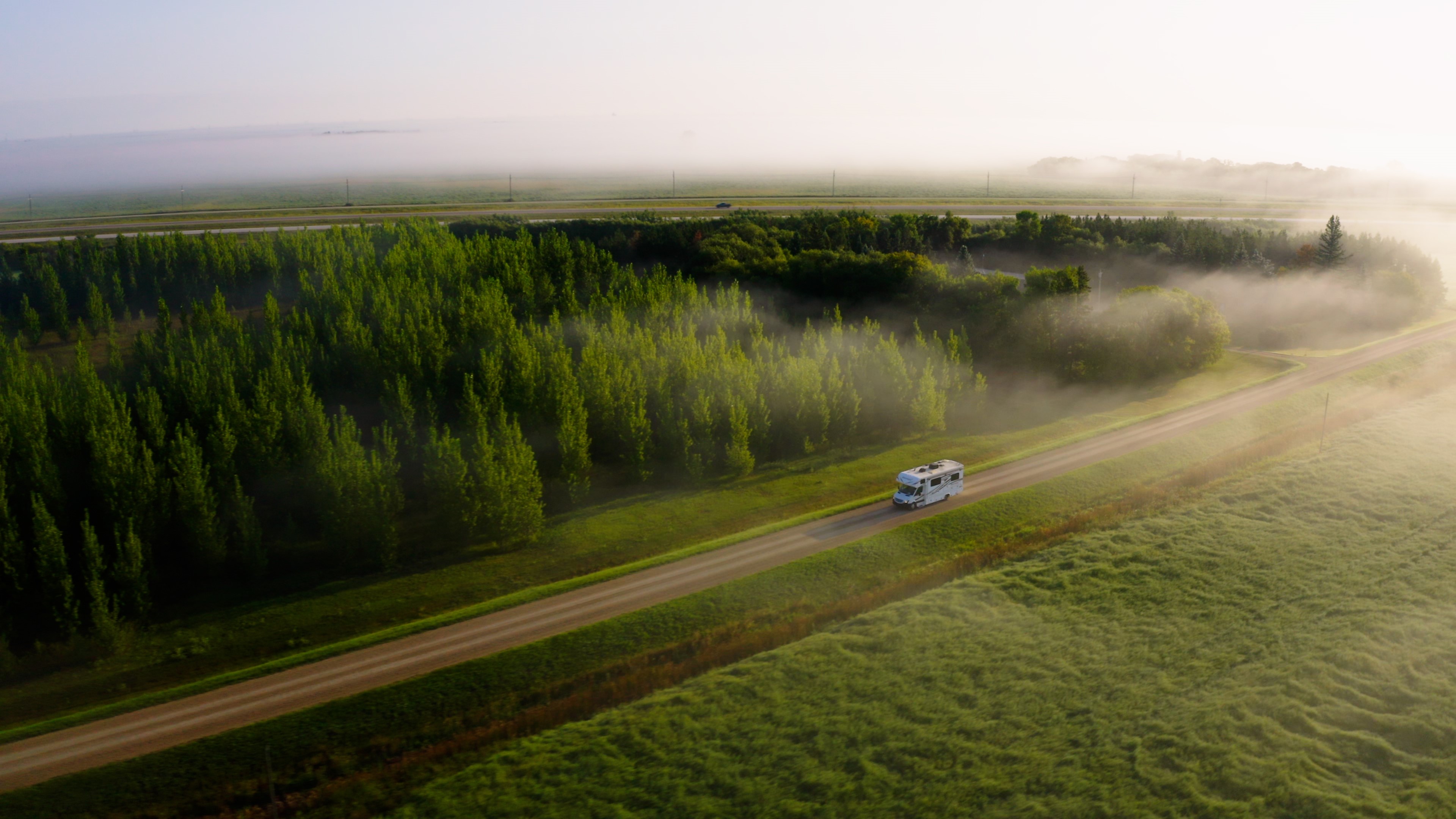 Driving through Whiteshell Provincial Park, Manitoba. Photo by Handcraft, courtesy Travel Manitoba.